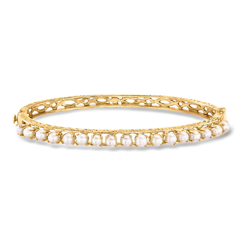 C. 1980 Vintage 3.5mm Cultured Pearl Bangle Bracelet in 14kt Yellow Gold. 7" image number 0