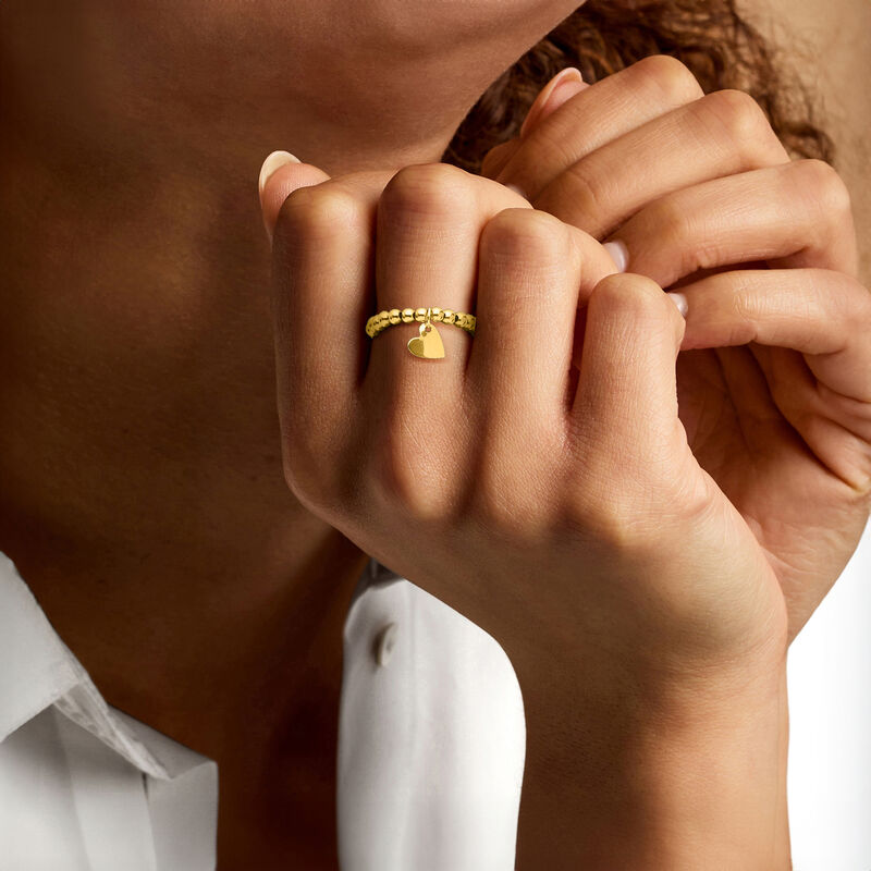 3mm 14kt Yellow Gold Bead Stretch Ring with Heart Charm. Large (9 - 10) image number 1