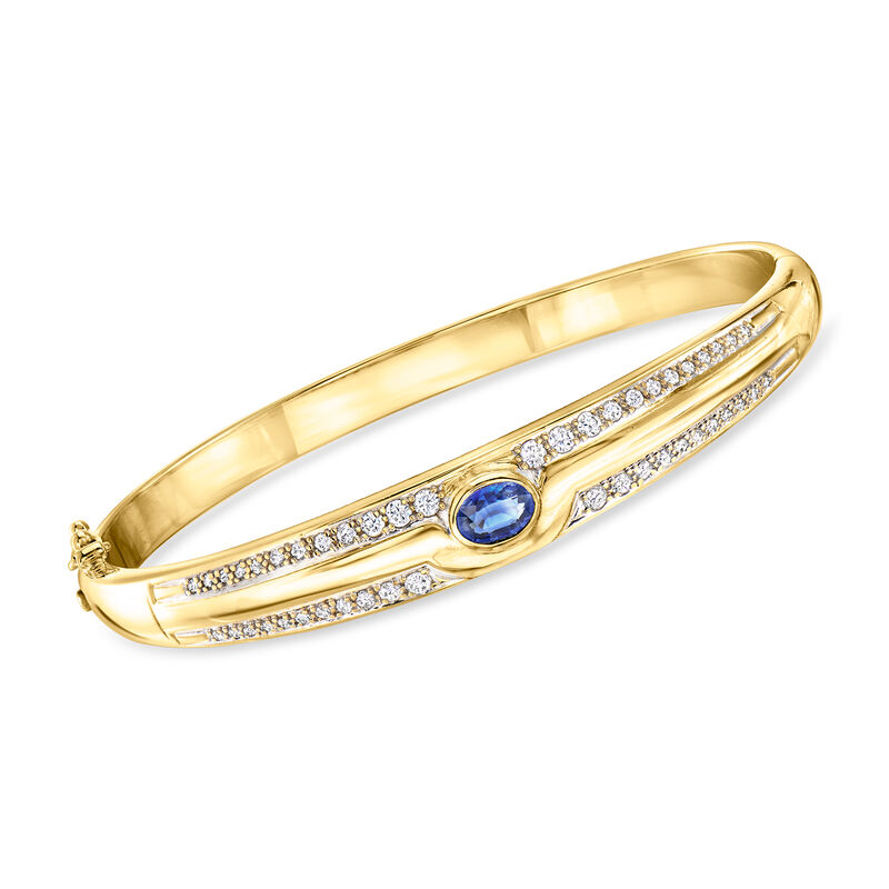 C. 1980 Vintage .75 Carat Sapphire and 1.00 ct. t.w. Diamond Bangle Bracelet in 18kt Yellow Gold. 7" image number 0