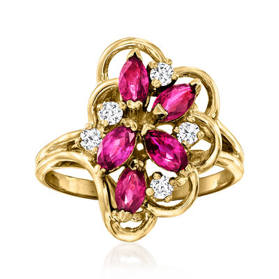 C. 1980 Vintage 1.25 ct. t.w. Ruby and .25 ct. t.w. Diamond Cluster Ring in 14kt Yellow Gold
