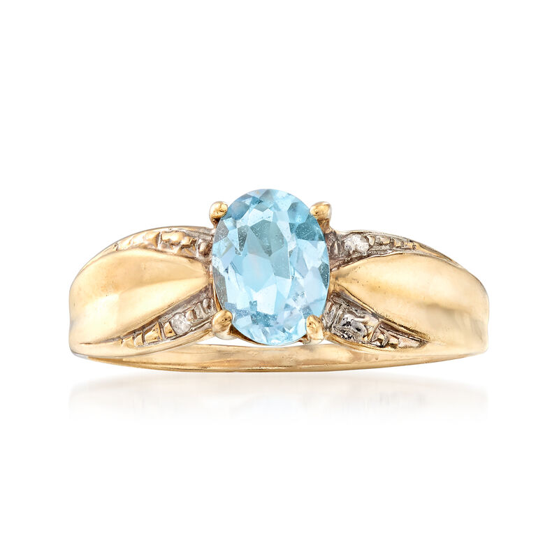 C. 1980 Vintage .90 Carat Blue Topaz Ring with Diamond Accents in 10kt Yellow Gold image number 0