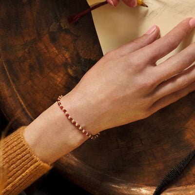 6.00 ct. t.w. Ruby and 10kt Yellow Gold Bead Stretch Bracelet