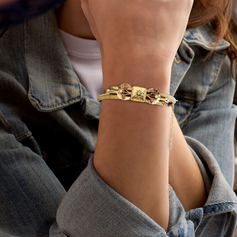 C. 1940 Vintage 2mm Cultured Pearl and .20 ct. t.w. Ruby Bow Bangle Bracelet with Diamond Accents in 14kt Yellow Gold. 7&quot; image number 1