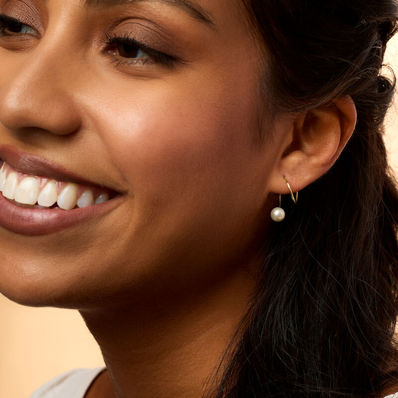 5.5-6mm Cultured Pearl Spiral Hoop Earrings in 14kt Yellow Gold. 5/8" image number 3