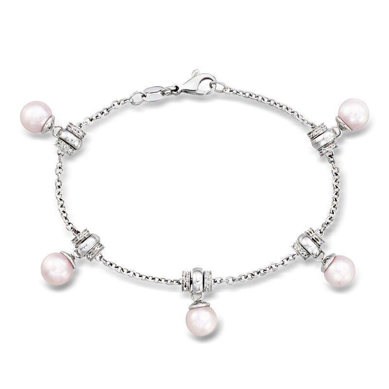 C. 1990 Vintage 7mm Cultured Pearl and .60 ct. t.w. Diamond Station Bracelet in 18kt White Gold. 7" image number 0