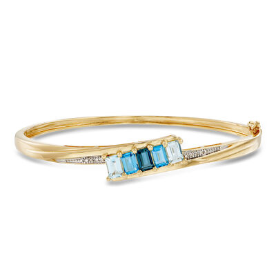 3.10 ct. t.w. Tonal Blue Topaz Bangle Bracelet with Diamonds in 18kt Gold Over Sterling