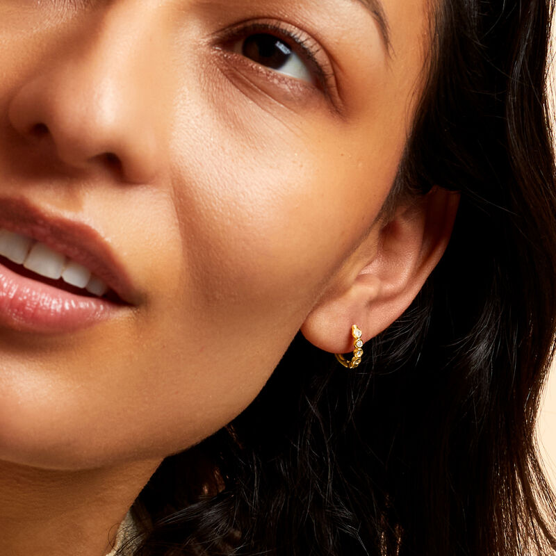 .15 ct. t.w. Bezel-Set Diamond Huggie Hoop Earrings in 14kt Yellow Gold. 3/8&quot; image number 2