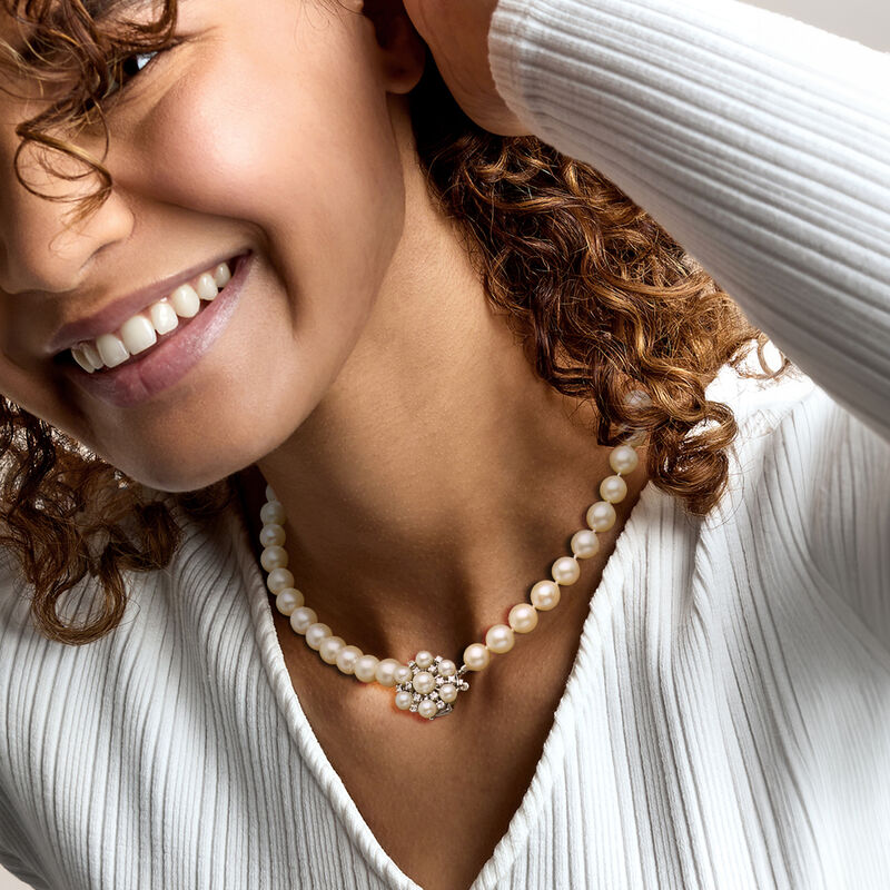 C. 1980 Vintage 6-8.5mm Cultured Pearl and .30 ct. t.w. Diamond Cluster Necklace with 14kt White Gold. 16" image number 1