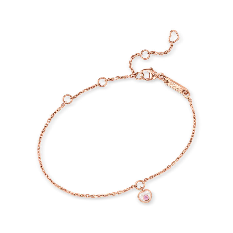 C. 2000 Vintage Chopard 18kt Rose Gold Heart Bracelet with Single Pink Sapphire. 5.25" image number 0