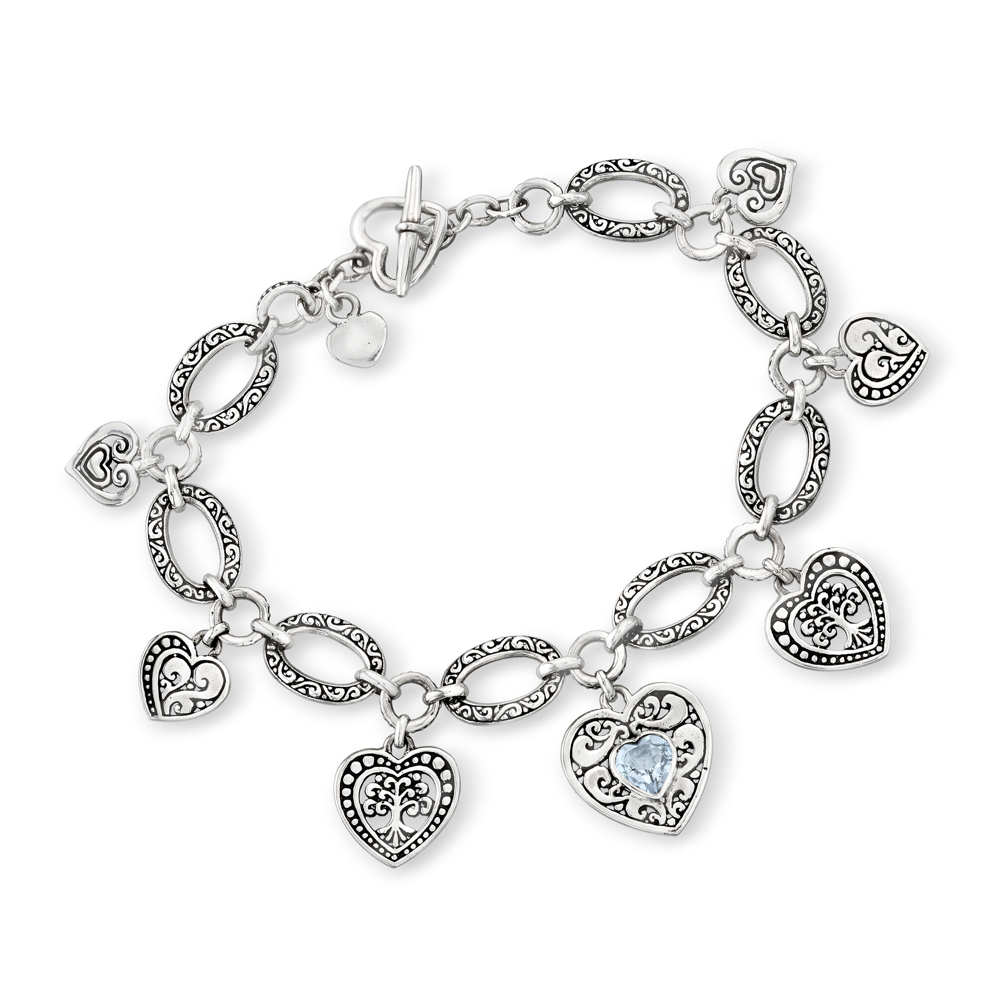 Sterling Silver Bali-Style Heart Charm Bracelet with .10 Carat Sky
