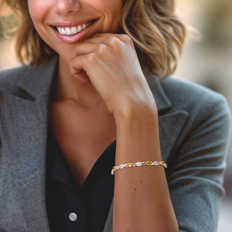 C. 1990 Vintage 4.50 ct. t.w. Yellow Sapphire and .50 ct. t.w. Diamond Bracelet in 14kt White Gold. 7.75&quot; image number 1