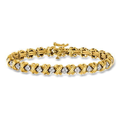C. 1990 Vintage 1.65 ct. t.w. Diamond XO Bangle Bracelet in 10kt Yellow Gold