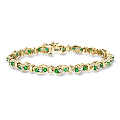C. 1980 Vintage 1.80 ct. t.w. Emerald and .95 ct. t.w. Diamond Link Bracelet in 14kt Yellow Gold