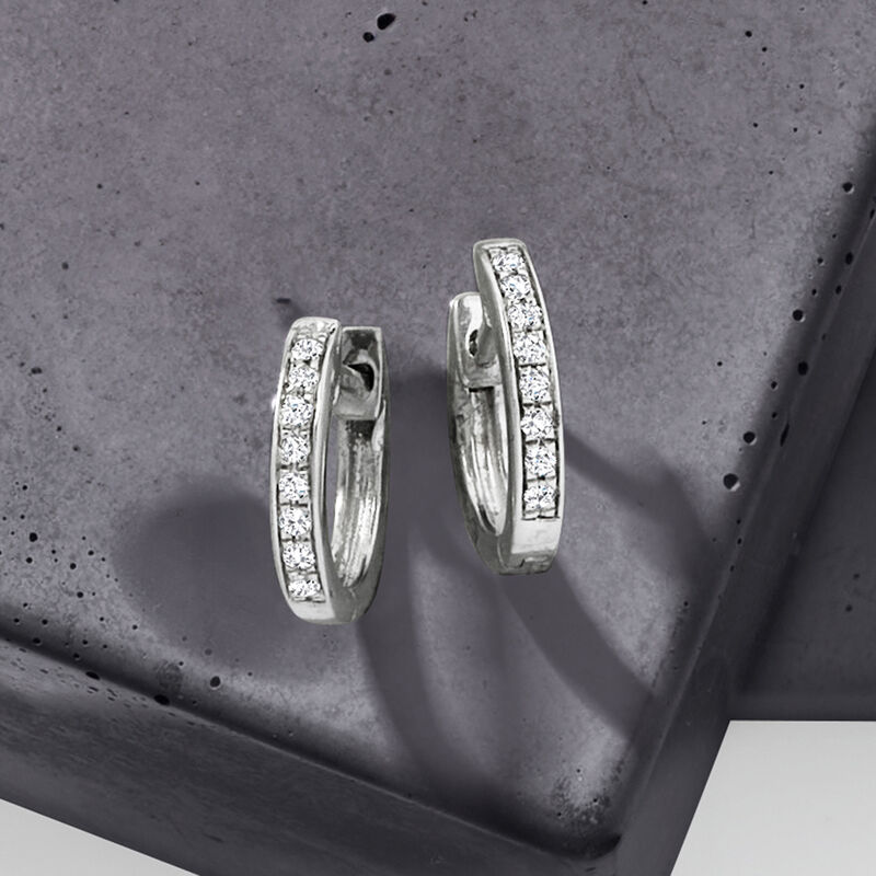 .10 ct. t.w. Diamond Huggie Hoop Earrings in Sterling Silver. 1/4&quot; image number 1