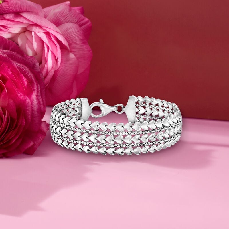 Pink pearl 4 row bracelet with sterling silver clip. Pink pearl 4 row bracelet with sterling silver clip.