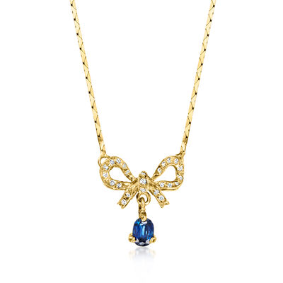 C. 1980 Vintage .55 Carat Sapphire Bow Necklace with .20 ct. t.w. Diamonds in 18kt Yellow Gold