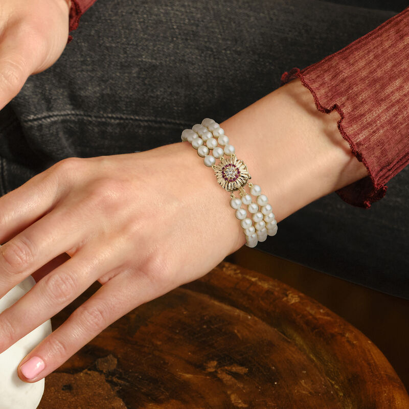 C. 1970 Vintage 5.5-6mm Cultured Pearl and .33 ct. t.w. Ruby Three-Row Bracelet with Diamonds in 14kt Yellow Gold. 7&quot; image number 1