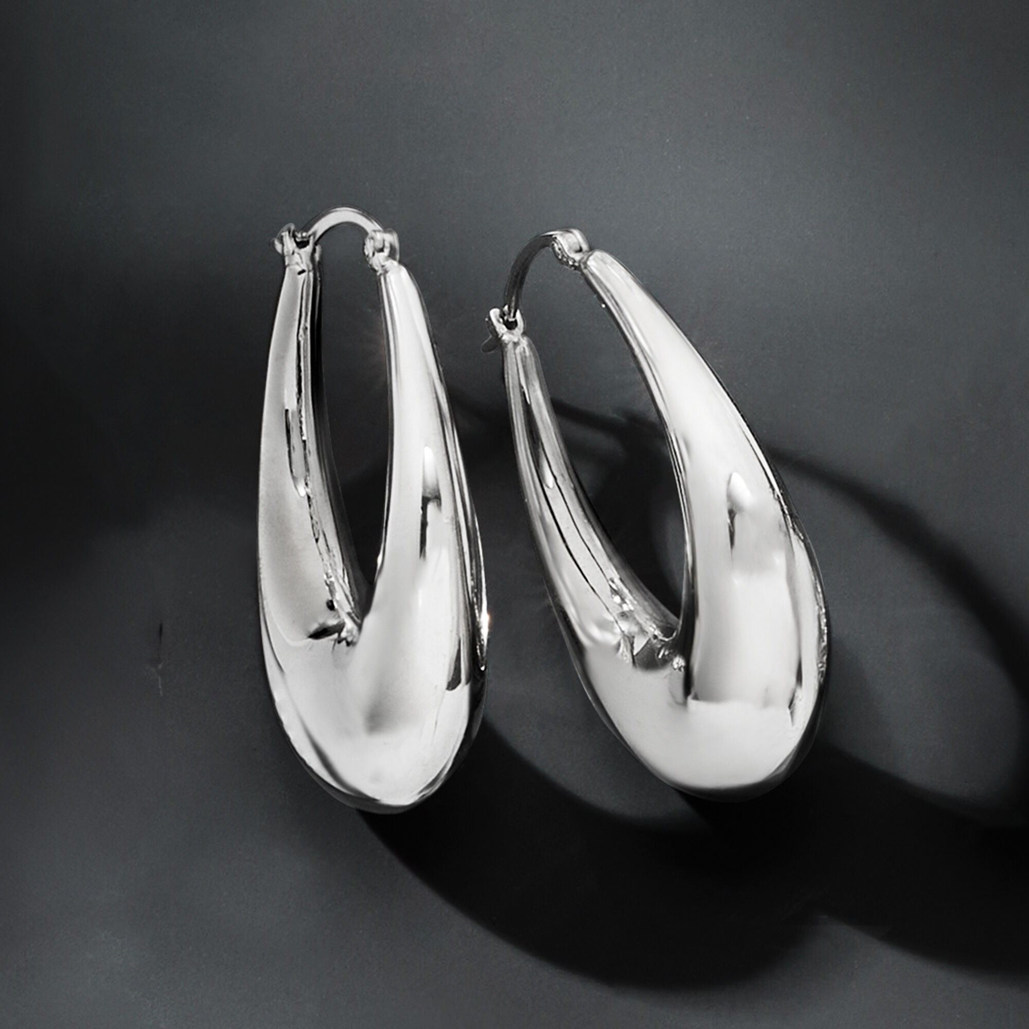 Sterling Silver Graduated Hoop Earrings. 1 1/4