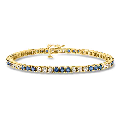C. 1980 Vintage 2.50 ct. t.w. Sapphire and 2.20 ct. t.w. Diamond Tennis Bracelet in 14kt Yellow Gold