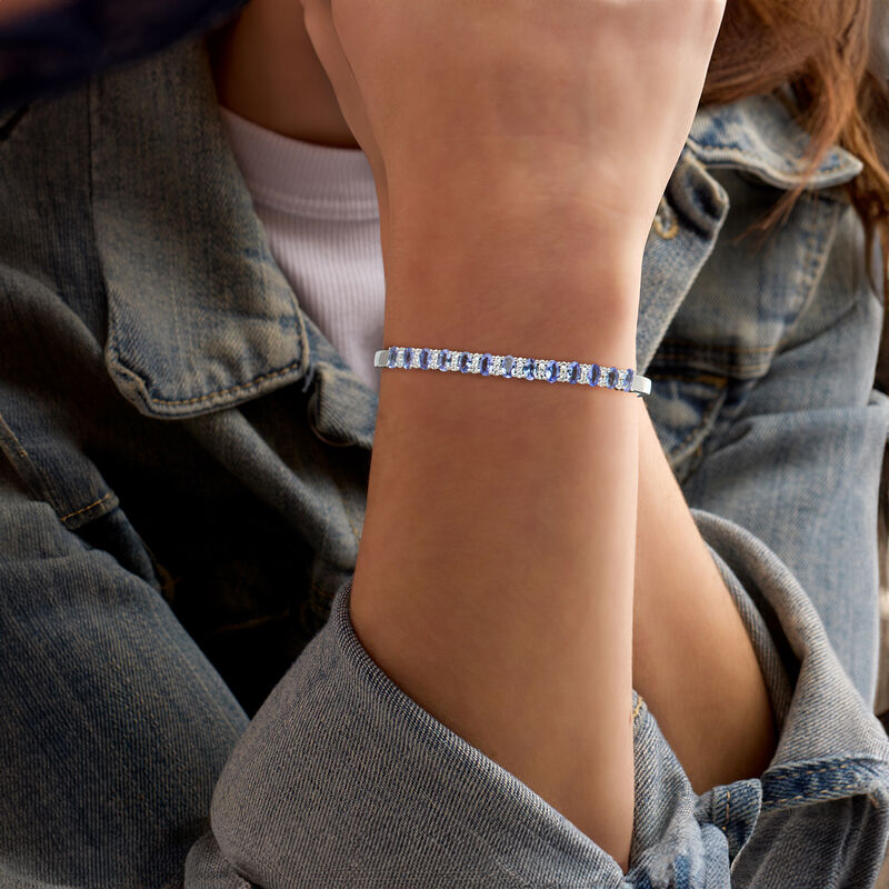 2.50 ct. t.w. Tanzanite and .70 ct. t.w. White Topaz Cuff Bracelet in Sterling Silver. 7&quot; image number 1