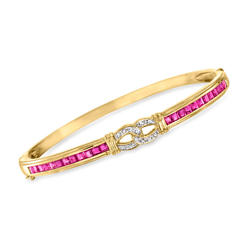 C. 1990 Vintage 2.40 ct. t.w. Ruby and .10 ct. t.w. Diamond Bangle Bracelet in 14kt Yellow Gold. 7" image number 0
