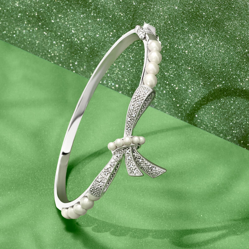 2-4.5mm Cultured Pearl and .11 ct. t.w. Diamond Bow Bangle Bracelet in Sterling Silver image number 2