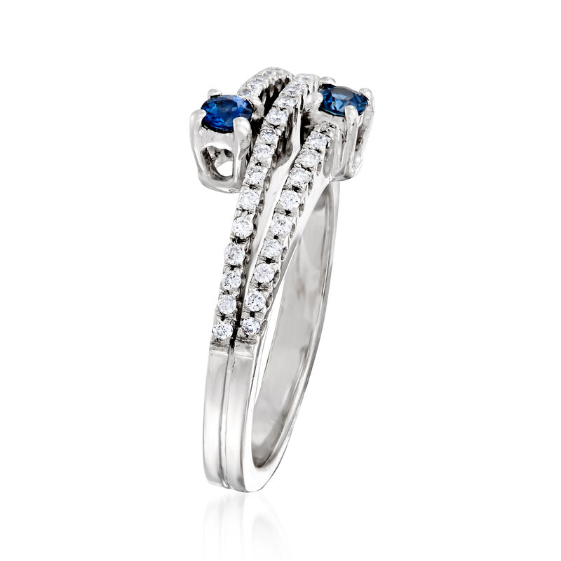 C. 1980 Vintage .30 ct. t.w. Diamond and .20 ct. t.w. Sapphire Bypass Ring in 18kt White Gold image number 2