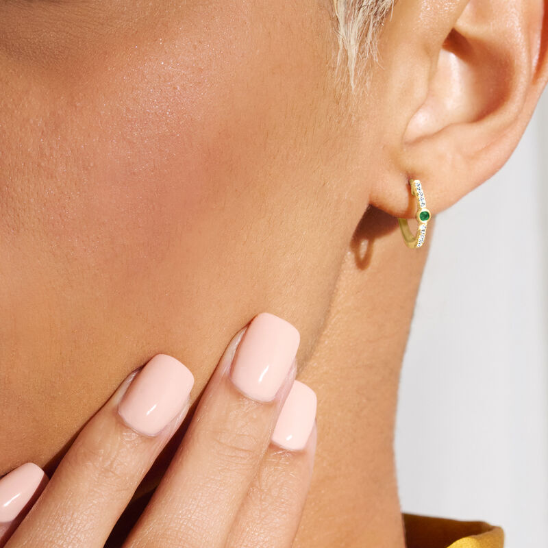 Emerald and Diamond Huggie Hoop Earrings in 14kt Yellow Gold. 3/8" image number 2