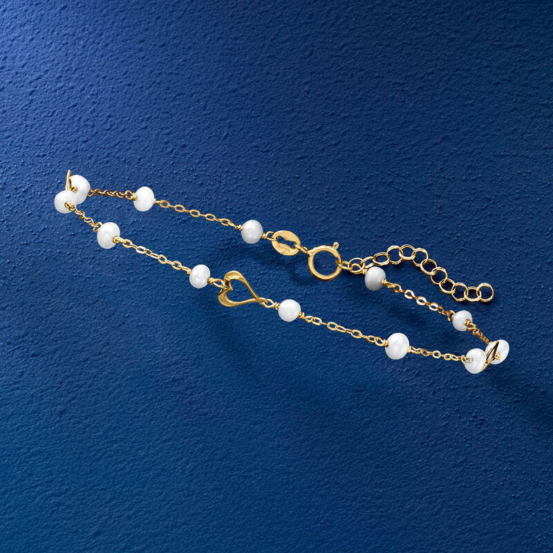 Italian 3-3.5mm Cultured Pearl and Heart Station Bracelet in 10kt Yellow Gold. 7" image number 2