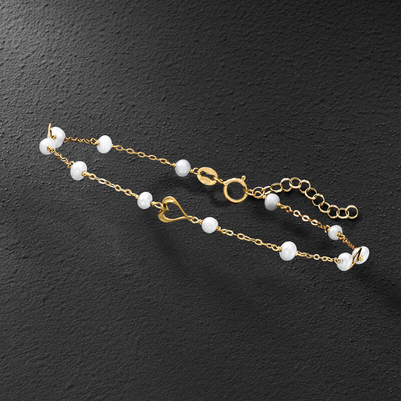 Italian 3-3.5mm Cultured Pearl and Heart Station Bracelet in 10kt Yellow Gold. 7" image number 2