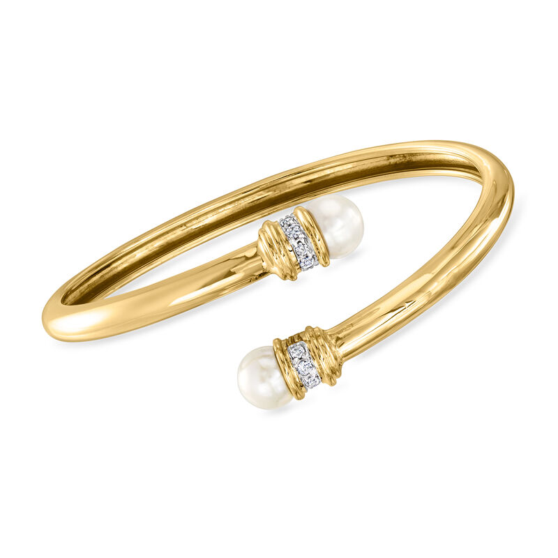 C. 1990 Vintage 8mm Cultured Pearl and .25 ct. t.w. Diamond Bypass Bracelet in 18kt Yellow Gold. 7&quot; image number 0