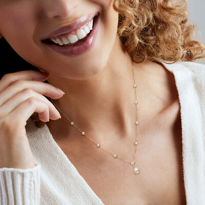 C. 1990 Vintage 4.5-11x8mm Cultured Pearl Station Necklace with Diamond Heart in 14kt Yellow Gold