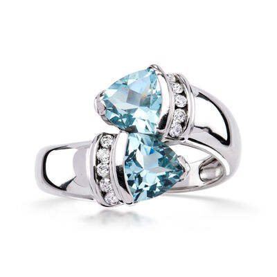 C. 1990 Vintage 1.80 ct. t.w. Sky Blue Topaz Bypass Ring with .16 ct. t.w. Diamonds in 14kt White Gold