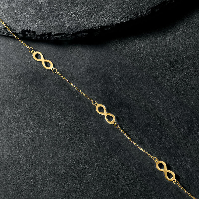 Italian 14kt Yellow Gold Infinity Station Bracelet. 7&quot; image number 1