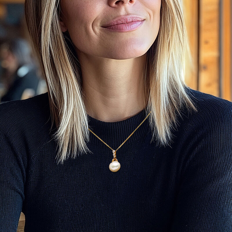 C. 1990 Vintage 14x12mm Cultured Pearl Pendant Necklace with .25 ct. t.w. Diamonds in 18kt Yellow Gold. 16" image number 1