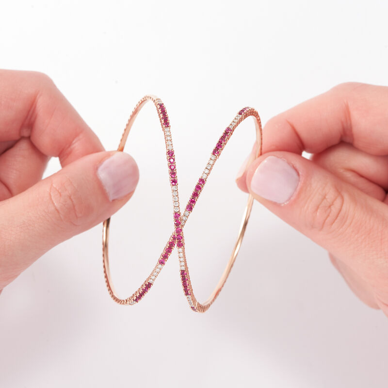 2.50 ct. t.w. Ruby and .52 ct. t.w. Diamond Wrap Bracelet in 18kt Rose Gold. 7&quot; image number 1