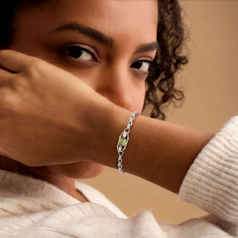 C. 1970 Vintage 1.25 Carat Peridot and .15 ct. t.w. Diamond Bracelet in 14kt White Gold. 6" image number 1