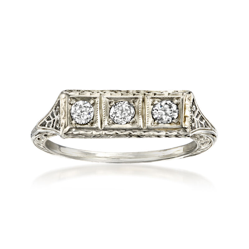 C. 1980 Vintage .10 ct. t.w. Diamond Three-Stone Ring in 18kt White Gold. Size 6 image number 0