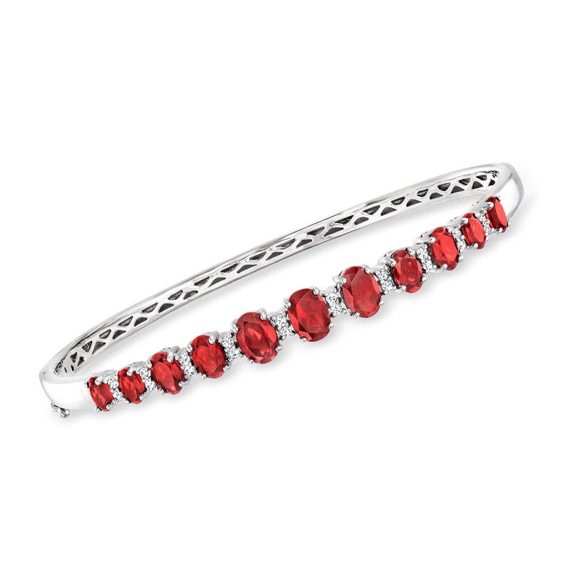 6.00 ct. t.w. Garnet and .40 ct. t.w. White Zircon Bangle Bracelet in Sterling Silver image number 0