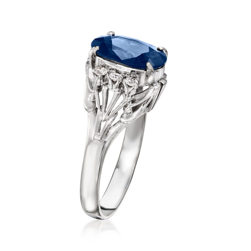 C. 1980 Vintage 2.32 Carat Sapphire Ring with .12 ct. t.w. Diamonds in Platinum. Size 5