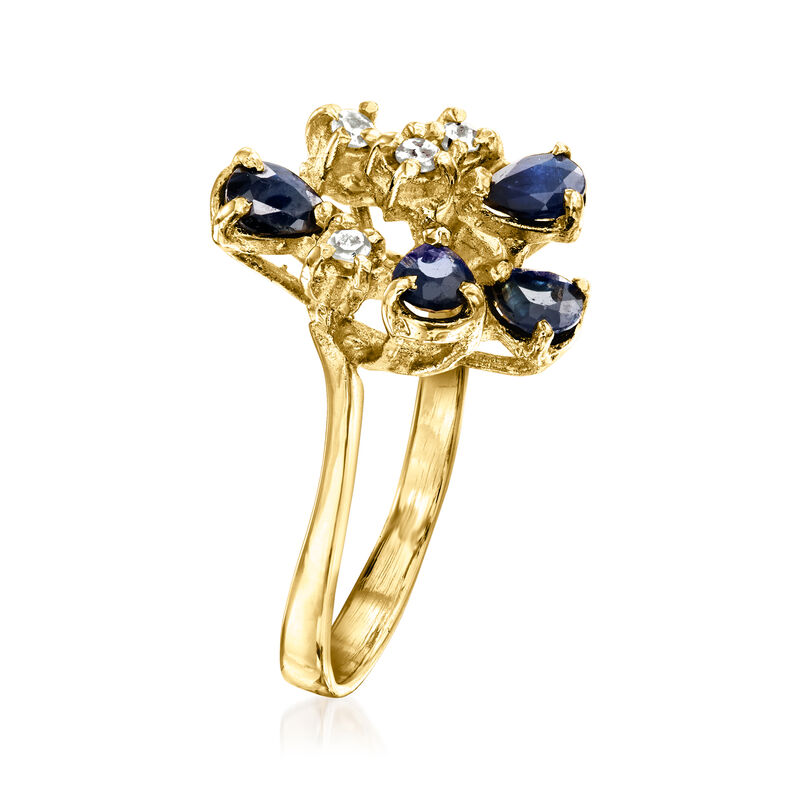 C. 1980 Vintage .80 ct. t.w. Sapphire and .10 ct. t.w. Diamond Cluster Ring in 18kt Yellow Gold. Size 6 image number 2
