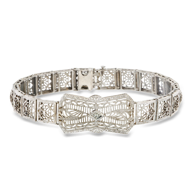 C. 1950 Vintage 14kt White Gold Openwork Bracelet with Single Diamond. 7.25" image number 0