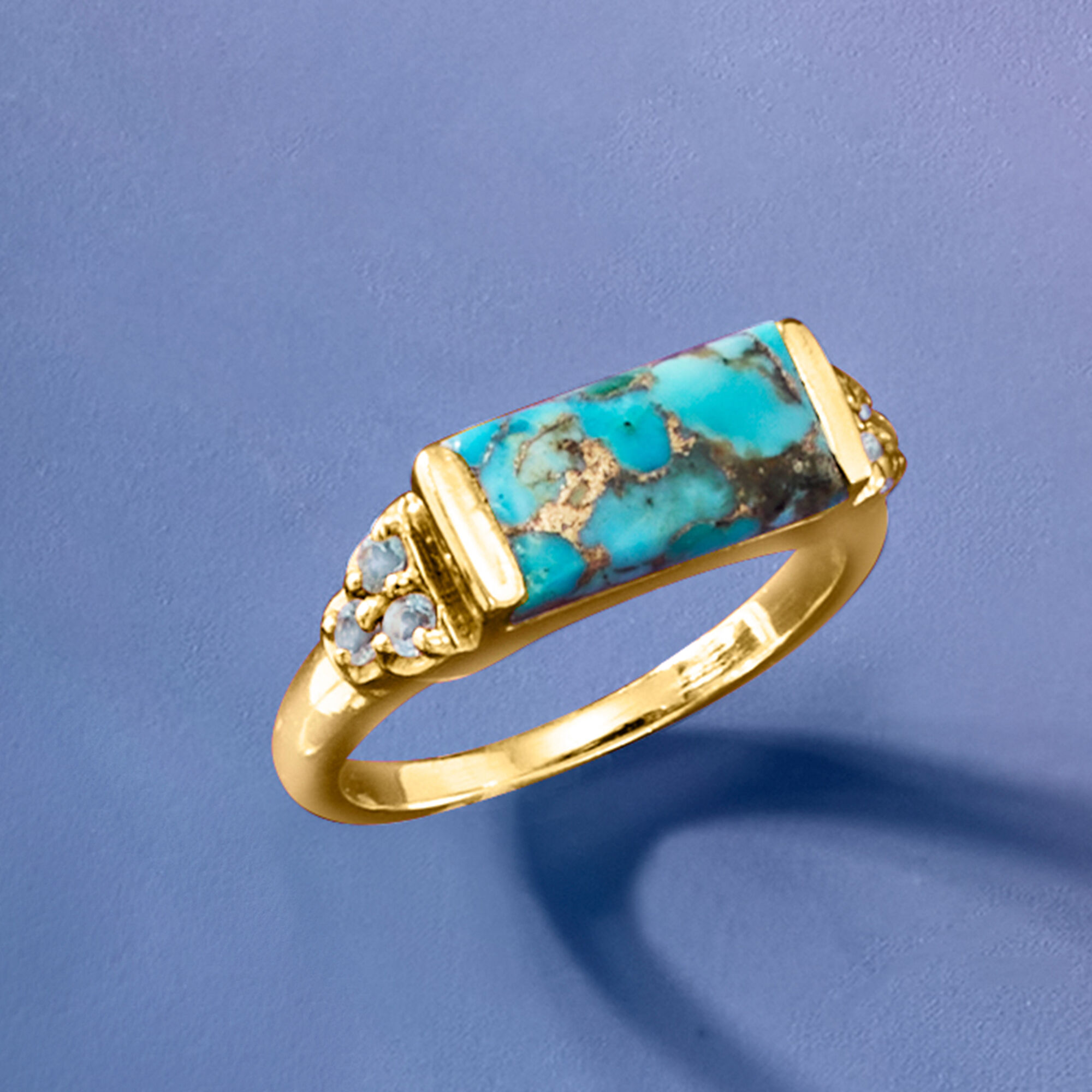 Turquoise and .70 ct. t.w. Sky Blue Topaz Ring in 18kt Gold