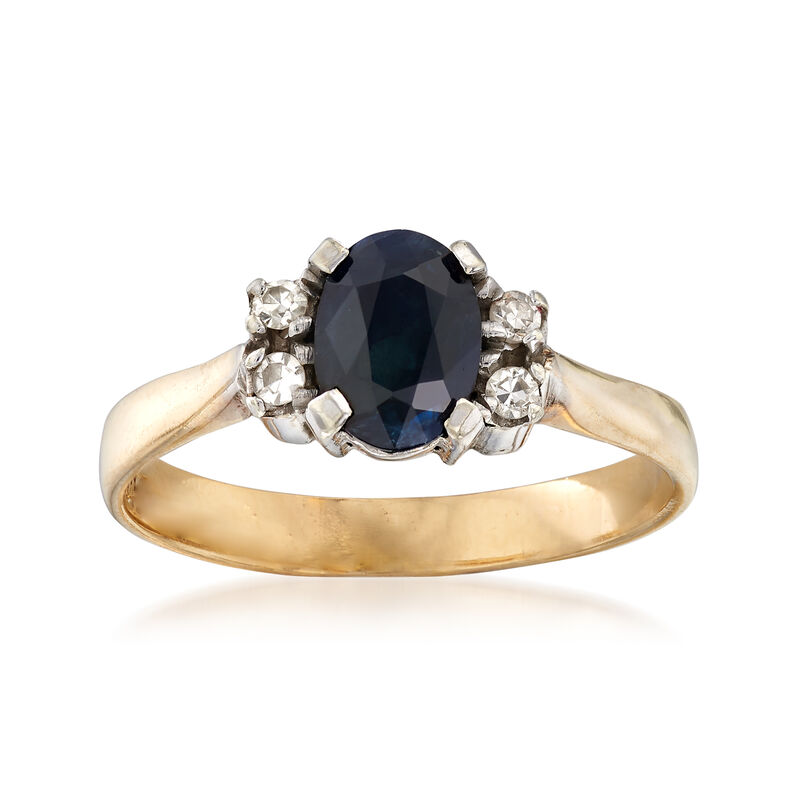 C. 1988 Vintage .90 Carat Sapphire Ring with Diamond Accents and British Hallmark in 9kt Yellow Gold image number 0