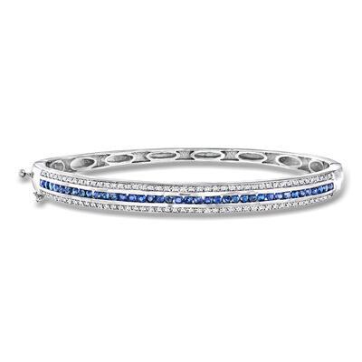 1.40 ct. t.w. Sapphire and .90 ct. t.w. White Zircon Bangle Bracelet in Sterling Silver