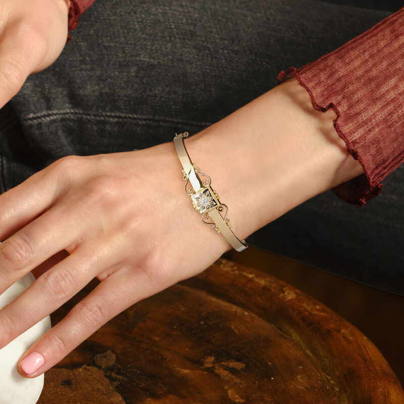 C. 1930 Vintage .33 ct. t.w. Diamond Scroll Bangle Bracelet in 15kt Yellow Gold. 7&quot; image number 1