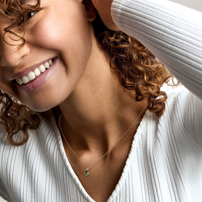 C. 1980 Vintage .70 Carat Green Tourmaline Pendant Necklace with Single Diamond in 14kt Yellow Gold. 16" image number 1