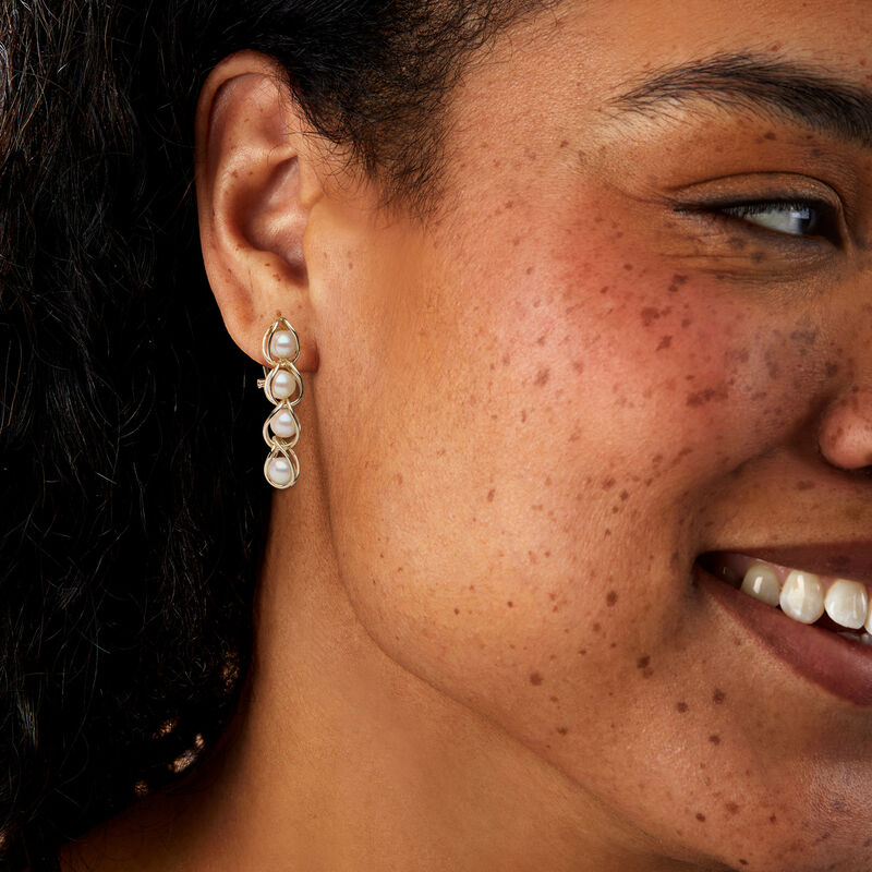 C. 1980 Vintage 5.5mm Cultured Pearl Caged Drop Earrings in 14kt Yellow Gold image number 1