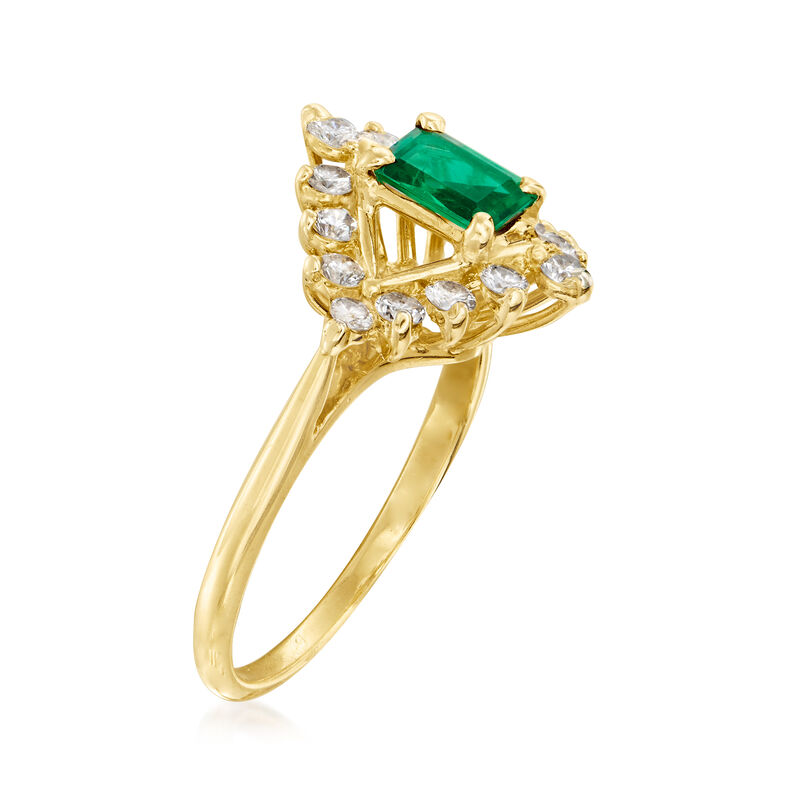 C. 1980 Vintage .55 ct. t.w. Diamond and .35 ct. t.w. Emerald Ring in 18kt Yellow Gold image number 2