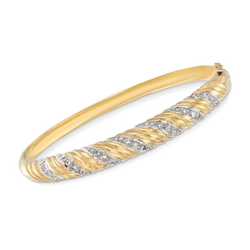 C. 1980 Vintage .70 ct. t.w. Diamond Swirled Bangle Bracelet in 14kt Yellow Gold image number 0